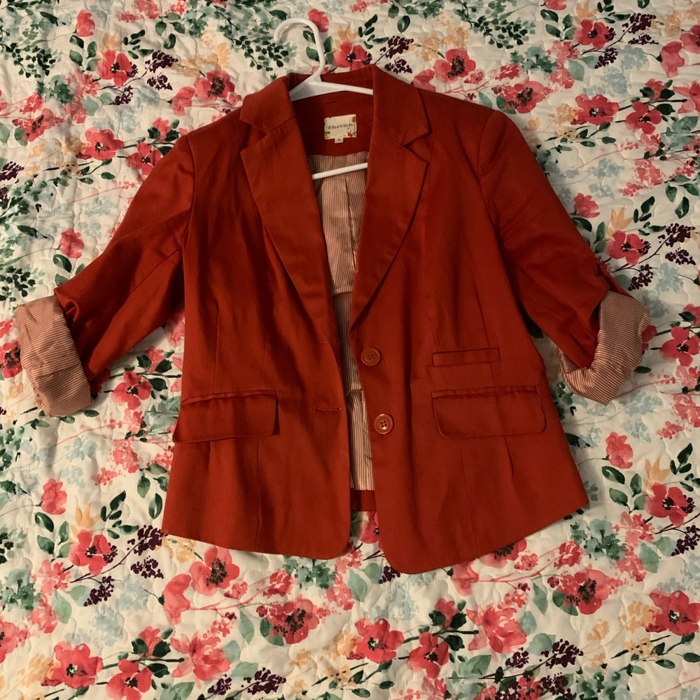 Red blazer.